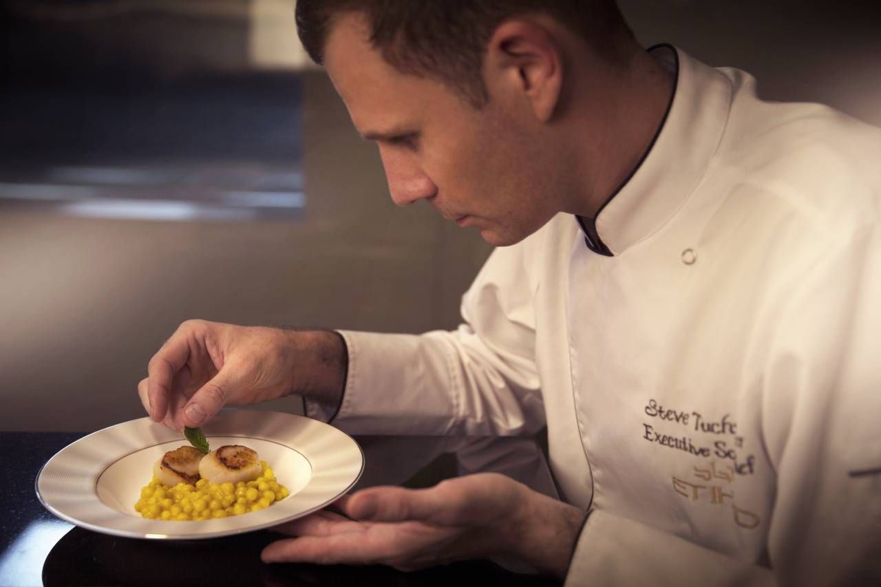 Dining Lounge Chef plating food