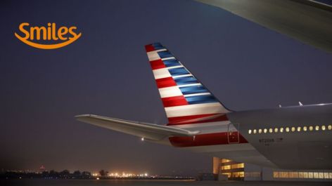 Smiles oferece 15% de desconto para voar com a American Airlines ao transferir pontos do cartão